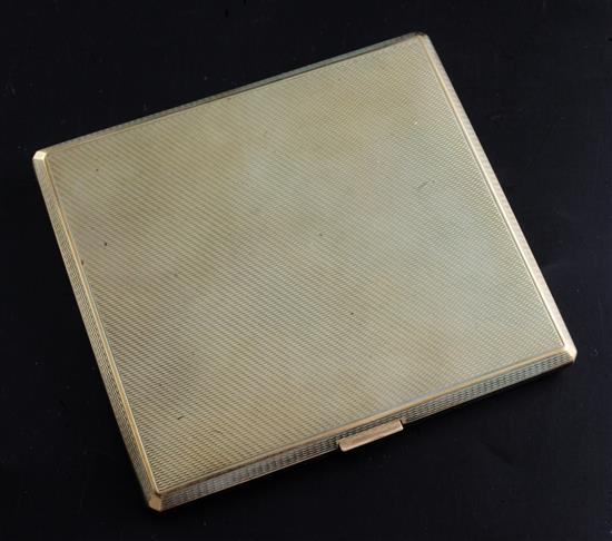 A 1930s engine turned 9ct gold cigarette case, 93mm.